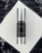 Skin Serum | A studio image of a Dr Hala Vitamin C Serum. The packaging is black with a silver lid and font.