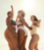 Exilis | A group of girlfriends in bikinis at the beach
