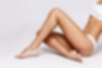 Exilis | A photo of a woman in a bikini posing to show her body shape